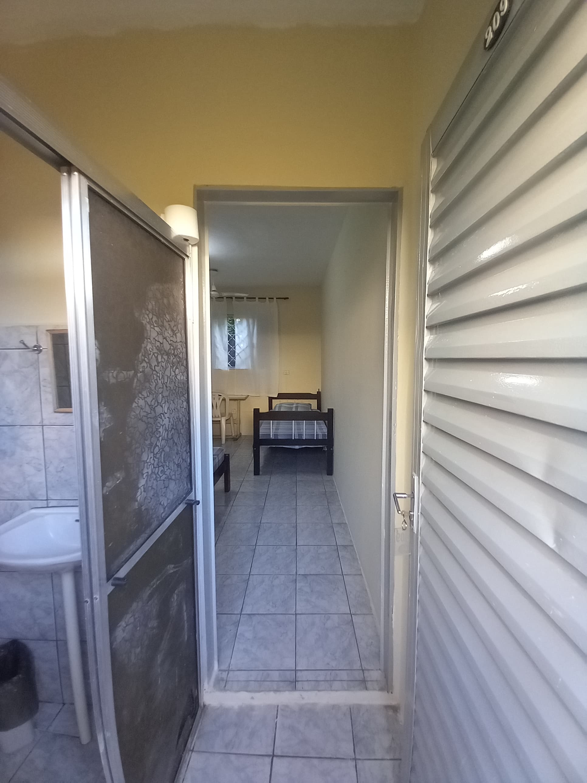 Quarto 209